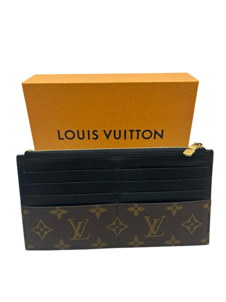 Louis Vuitton slim wallet/purse. This came with a